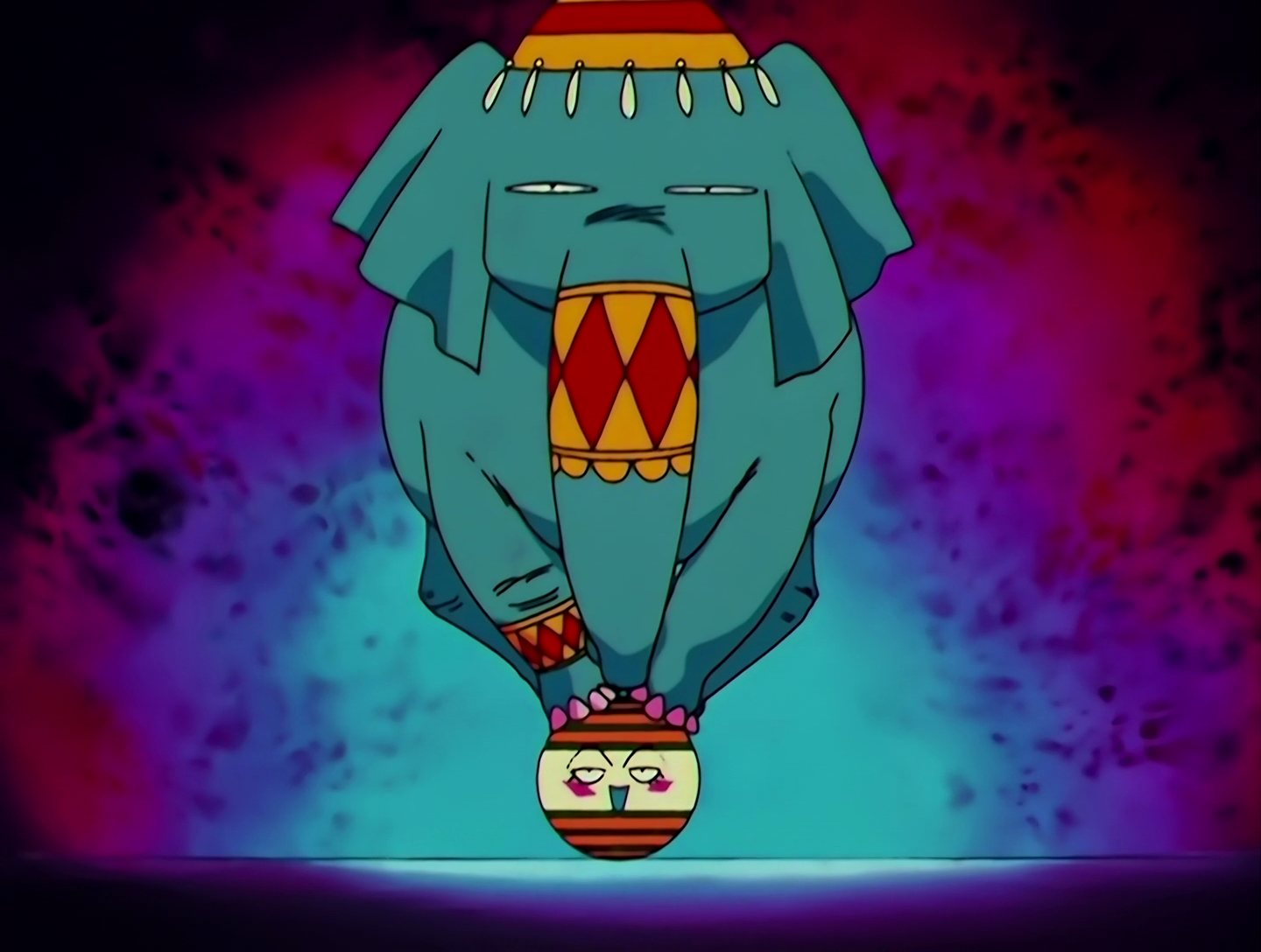 Elephanko, a Lemures from Sailor Moon episode 146. Hahahaha. This one is great. An elephant takes up most of the image, but the important part is at the bottom. The elephant is standing on a striped ball with a face. This is Elephanko, another ball Lemures. She has a smug expression.
